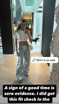Jena Sims flaunts her new silver denim pants. Image via Instagram @jenasims